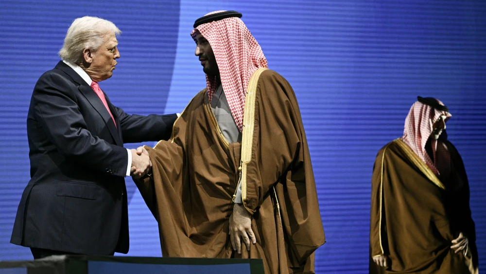 U.S. President Donald Trump shakes hands with Saudi Crown Prince Mohammed bin Salman at the U.S.-Saudi Investment Forum at the John F. Kennedy Center for the Performing Arts in Washington, D.C. on Nov. 19, 2025. Photo by Brendan Smialowski/AFP via Getty Images.