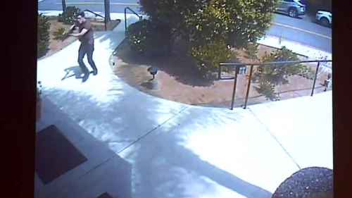 Surveillance footage at the Chabad of Poway, Calif., shown as evidence in the preliminary hearing of John Earnest on Sept. 19, 2019, showing the suspect starting his shooting spree on April 27, 2019. A woman was killed and three others were injured. Credit: Chabad of Poway via San Diego Superior Court.