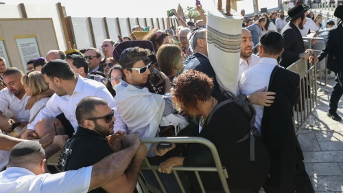 Members of the Reform movement and Hebrew Union College confront police and security guards while trying to enter a mixed men and women prayer area at the public square in front of the Western Wall in Jerusalem's Old City on Nov. 16, 2017.