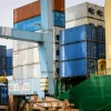 Workers unload shipping containers at Ashdod Port on Israel's southern coast on April 5, 2020. Photo by Flash90.