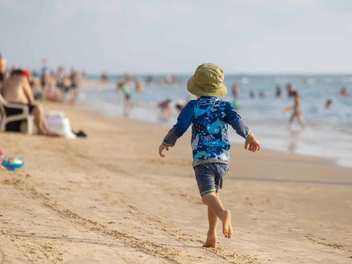 People enjoy the beach in Bat Yam in central Israel, July 25, 2025. Photo by Dor Pazuelo/Flash90.