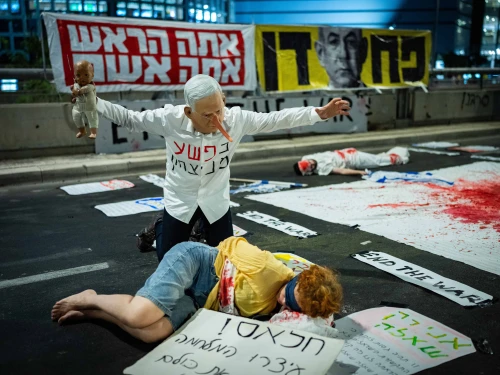 Anti-government protesters demonstrate for the release of Israelis held hostage in the Gaza Strip, outside IDF headquarters in Tel Aviv, Aug. 23, 2025. Photo by Erik Marmor/Flash90.