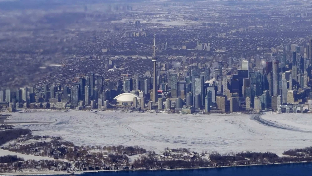 An aerial view as ice covers Lake Ontario between the Toronto Islands and the downtown shoreline on Feb. 8, 2026, in Toronto, Canada. Photo by Gary Hershorn/Getty Images.