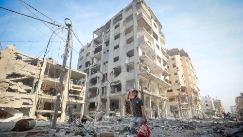 A Palestinian walks past the rubble of houses destroyed by Israeli airstrikes in the Jabalia area in the northern Gaza Strip, Oct. 11, 2023. Photo: Atia Mohammed/Flash90