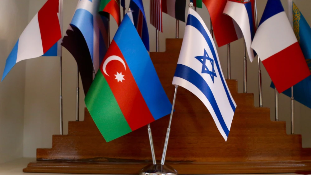 Israeli and Azerbaijani flags at the Baku Summit of World Religious Leaders. Credit: Akos Nagy.