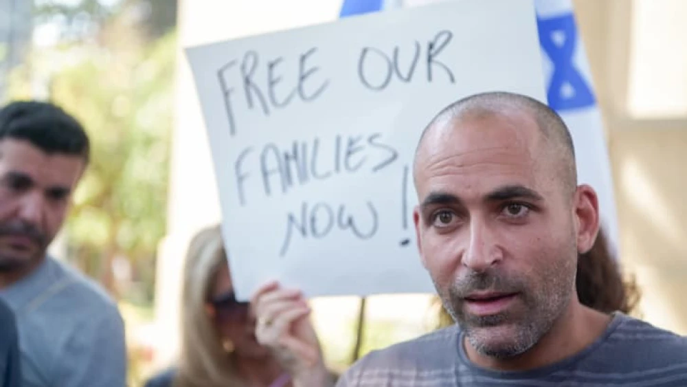 Avichai Brodetz, whose famly is held hostage by Hamas in Gaza, protests outside IDF headquarters in Tel Aviv, Oct. 14, 2023. Photo by Avshalom Sassoni/Flash90.
