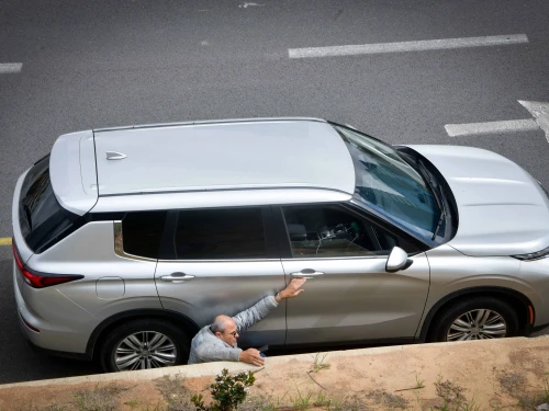 Israelis take cover on the Ayalon Highway as rocket sirens sound in Tel Aviv, March 20, 2025. Photo by Avshalom Sassonif/Flash90.