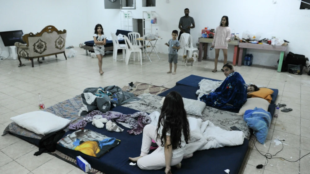 Two Jewish families spend their days in a bomb shelter, as rockets are fired by Hamas from Gaza into Israel in the southern Israeli city of Ashkelon, May 13, 2021. Photo by Avi Roccah/Flash90.