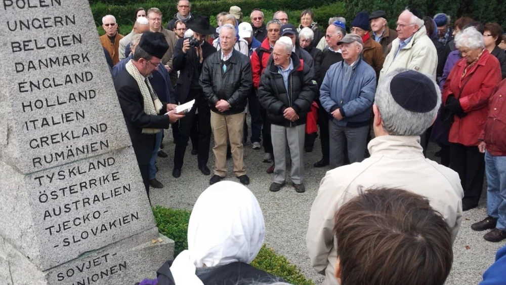 Jews attend a commemoration ceremony in Malmö's Jewish cemetery on Sept. 23. 2012. Photo by Canaan Lidor.