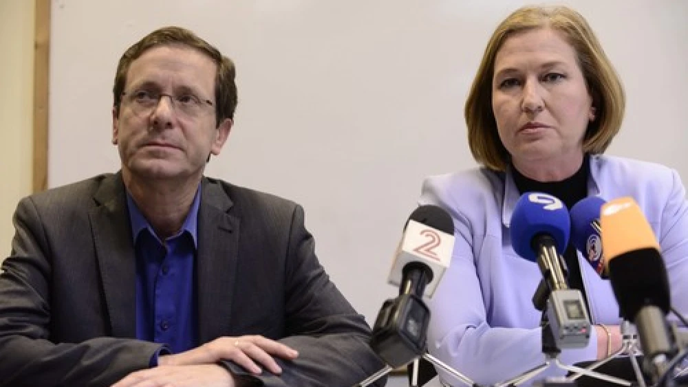 Zionist Union party leaders Isaac Herzog and Tzipi Livni are pictured at a press conference in Tel Aviv on March 18, when official Israeli election results revealed that they had been decisively defeated by Prime Minister Benjamin Netanyahu's Likud party. While two of the previous night's three television exit polls had Zionist Union and Likud tied at 27 Knesset seats, Likud would ultimately prevail with a comfortable 30-24 advantage. Credit: Tomer Neuberg/Flash90.