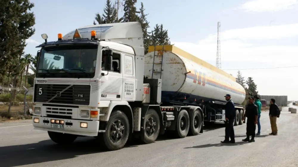 A Palestinian truck carrying fuel is seen after entering Rafah in the southern Gaza Strip, Dec. 5, 2013. Photo by Abed Rahim Khatib/Flash90.