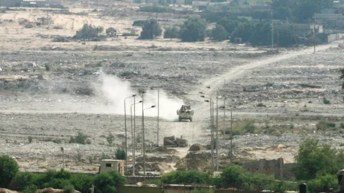 Egyptian armored vehicles patrol on the Egyptian side of the Gaza border, seen from the south of the Gaza Strip, on July 2, 2015. Photo by Abed Rahim Khatib/Flash90.