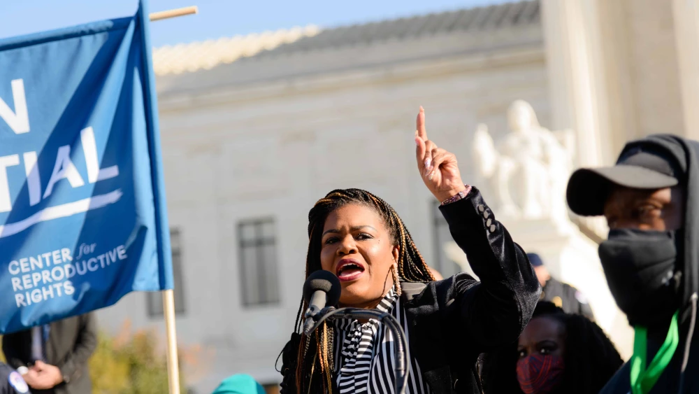 Rep. Cori Bush (D-Mo.) speaking at an abortion rights rally at the U.S. Supreme Court in Washington, D.C., on Dec. 1, 2021. Credit: Shala W. Graham/Shutterstock.