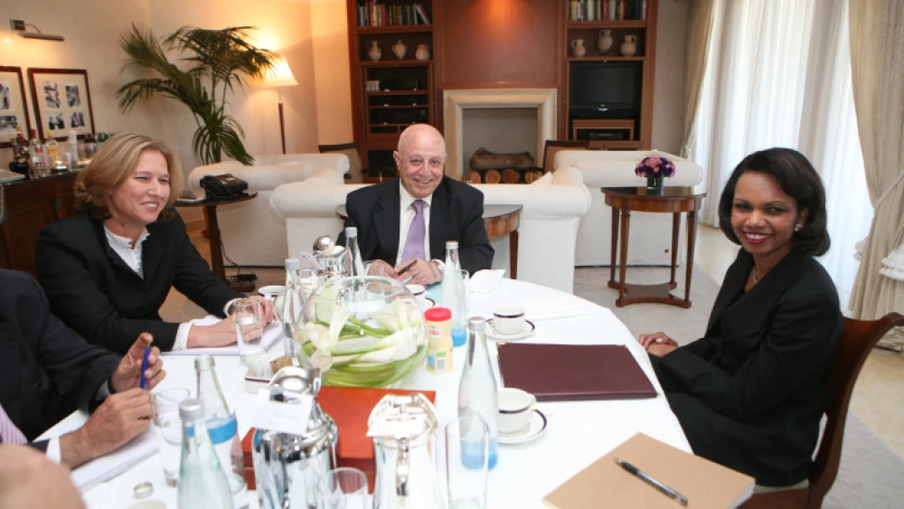 U.S. Secretary of State Condoleezza Rice (right), Israeli Foreign Minister Tzipi Livni (left) and Palestinian negotiators Ahmed Qurei (center) and Saeb Erekat (not pictured) meet in Jerusalem on May 4, 2008. Photo by Yossi Zamir/Flash90.
