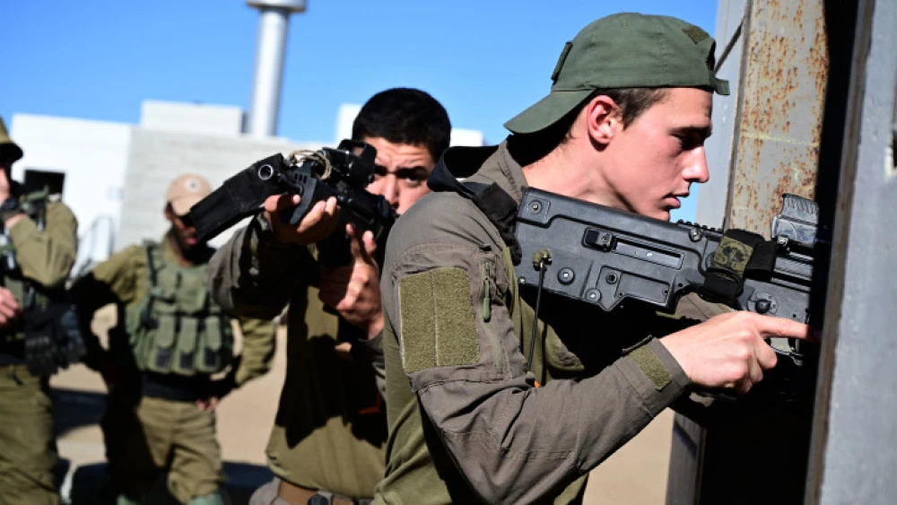 Infantry soldiers of the Golani 51st brigade train in underground tunnel urban warfare at a mock arab village near Kibbutz Merom Golan before heading south to the Gaza strip. El-Poran, Golan Heights. May 15, 2021. Photo by Michael Giladi/ Flash90 *** Local Caption *** ?????? ??"? ????? ??????? ????? ????