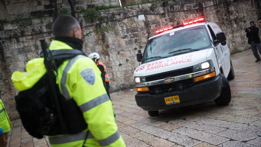 Police and medical personnel at the scene of an attempted stabbing at Lion's Gate in Jerusalem's Old City, on Feb. 22, 2020. Photo by Yonatan Sindel/Flash90.