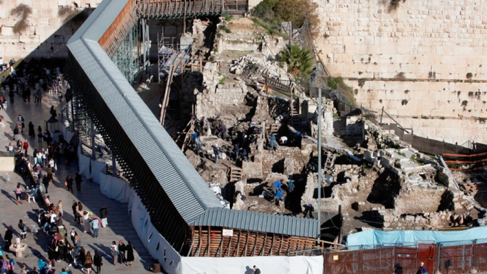 Israel Antiquities Authority workers seen working under the Mughrabi bridge leading to the Al-Aqsa Mosque in the Old City of Jerusalem, on Dec. 31, 2012. Photo by Sliman Khader/Flash90.