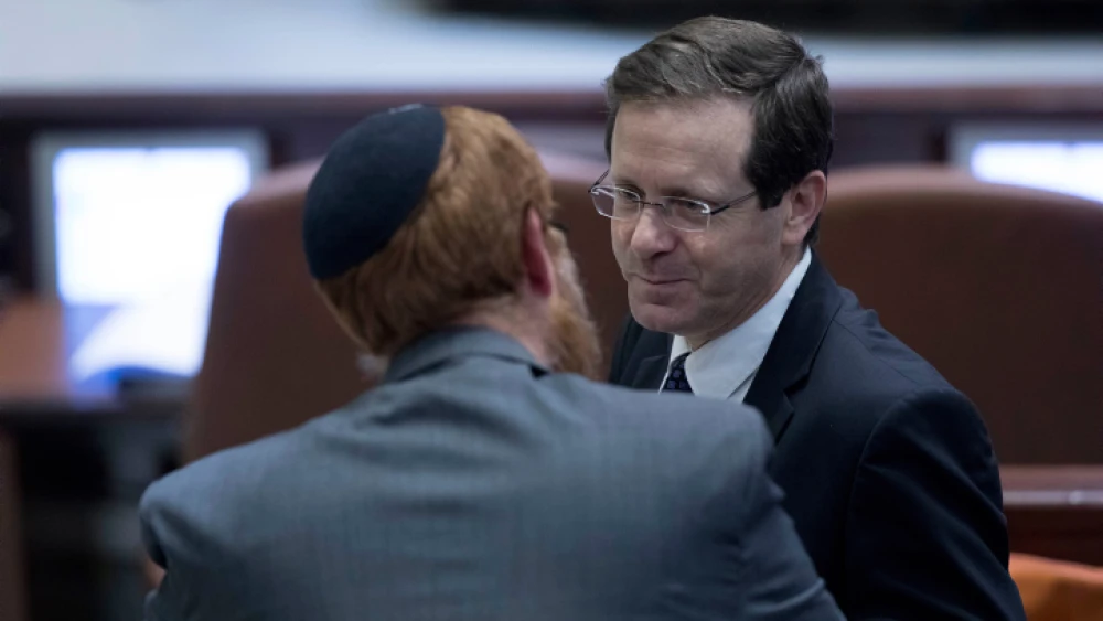 Then-opposition leader Isaac Herzog (right) and Knesset member Yehuda Glick in the Knesset plenum hall on Feb. 6, 2017. Photo by Yonatan Sindel/Flash90.