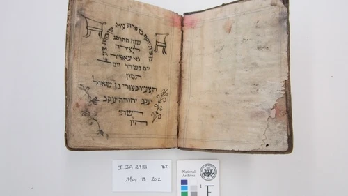 Before treatment by the National Archives and Records Administration, this Passover Haggadah from 1902 was recovered from the Mukhabarat, Saddam Hussein’s Intelligence Headquarters. It's part of what has become known as the Iraqi Jewish Archive. Credit: National Archives and Records Administration.