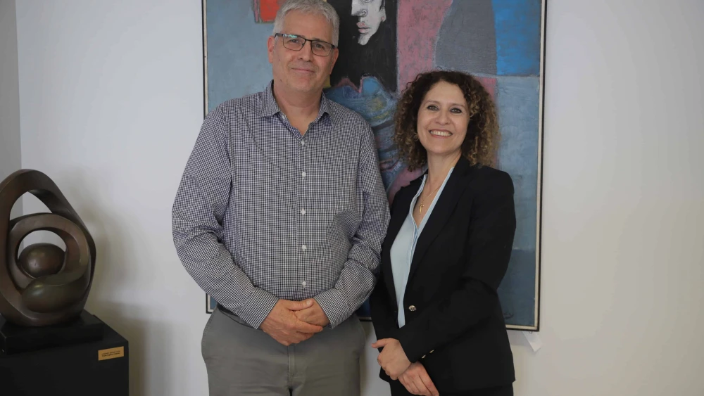 Professor Mouna Maroun, the incoming rector of University of Haifa, poses with incoming president, professor Gur Alorey. Credit: Courtesy of University of Haifa.