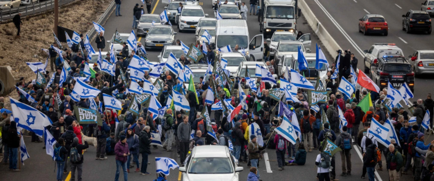 Protesters block Route 1 between Tel Aviv and Jerusalem over the Israeli government's judicial reforms, Feb. 9, 2023. Photo by Yonatan Sindel/Flash90.