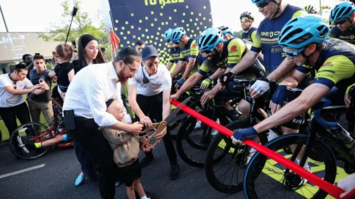 A child from Chai Lifeline cuts the ribbon to kick off Bike4Chai 2025. Credit: Courtesy.