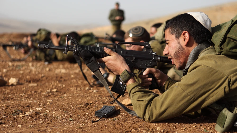 Israeli soldiers in the Nahal Haredi unit seen during a shooting exercise at the Peles Military Base in the northern Jordan Valley. Photo by Yaakov Naumi/Flash90.
