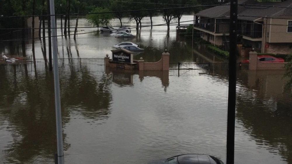 Click photo to download. Caption: The flooded street outside of the Houston apartment building of JNS.org's Jacob Kamaras on April 18, 2016. Credit: Jacob Kamaras.
