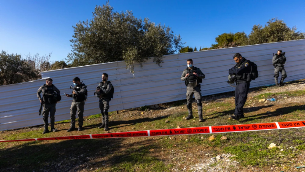 Israel Police guard the house in the Sheikh Jarrah neighborhood of eastern Jerusalem, whose squatter residents would be evicted two days later, Jan. 17, 2022. Photo by Olivier Fitoussi/Flash90.