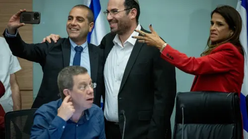 MK Simcha Rothman (center), head of the Constitution, Law and Justice Committee, with MK Ofir Katz (left) after the panel met in Jerusalem, July 19, 2023. Photo by Yonatan Sindel/Flash90.