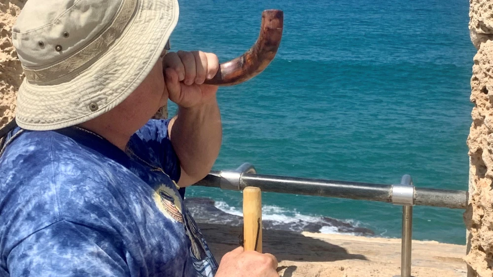 Blowing shofar. Credit: Courtesy/Shofar So Great.
