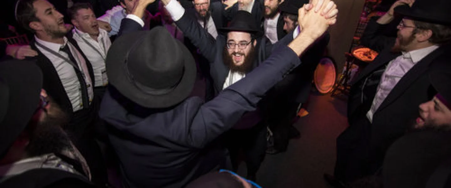 Emissaries and other guests rejoice during the Chabad-Lubavitch movement's 44th International Conference of Chabad-Lubavitch Emissaries (Kinus Hashluchim) in Bayonne, N.J., on Nov. 19, 2017. Credit: Chabad-Lubavitch/Chabad.org.