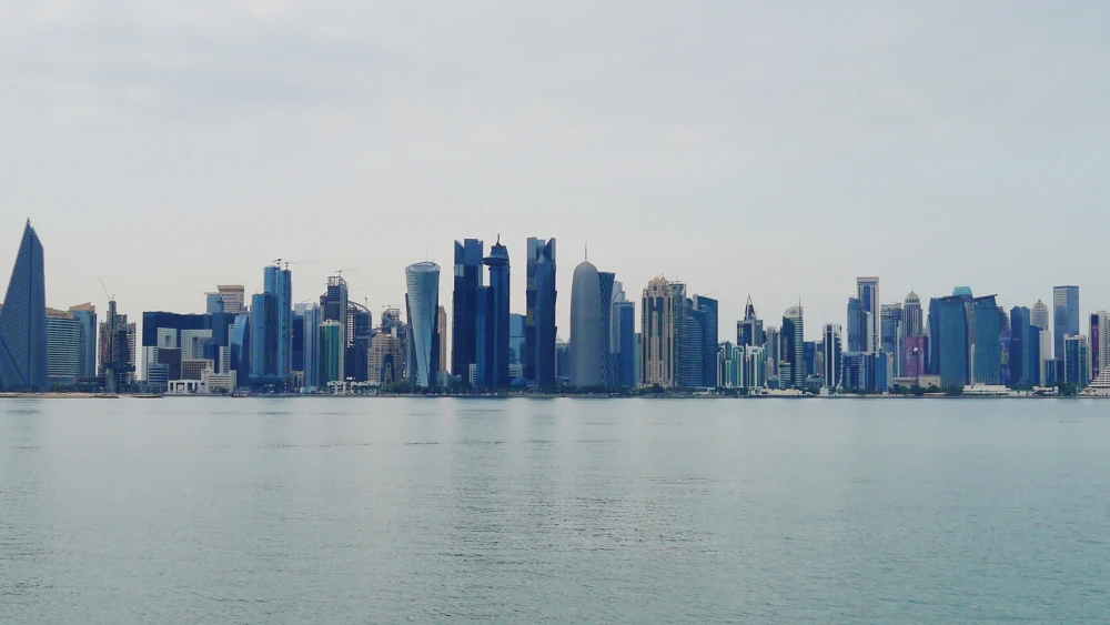 The Doha skyline in Qatar as seen from Dhow Harbour, Jan. 15, 2023. Credit: Zairon via Wikimedia Commons.