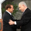 Israeli Prime Minister Benjamin Netanyahu welcomes his Italian counterpart Silvio Berlusconi at his office in Jerusalem. Feb. 1, 2010. Photo by Ariel Jerozolimski/Flash90.