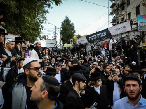 Jewish men in the street near the tomb of Rabbi Nachman of Breslov in Uman on eve of Rosh Hashanah, Sept. 25, 2022. Credit: Flash90.