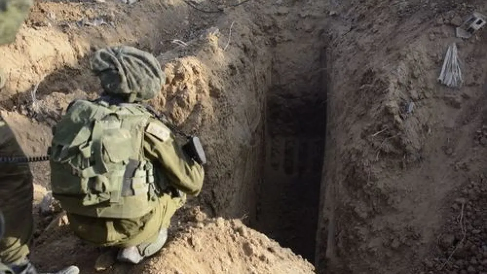 An Israeli soldier overlooks a Hamas tunnel in Gaza in July 2014, during “Operation Protective Edge.” Credit: Israel Defense Forces.