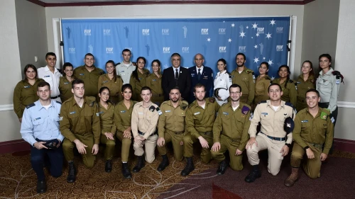 FIDF national director and CEO Maj. Gen. (Res.) Meir Klifi-Amir; Brig. Gen. Tal Kelman, head of the Strategic Division of the IDF Planning Directorate and former Chief of Staff in the Israeli Air Force (IAF); with Israeli soldiers at the 2018 FIDF National New York Gala Dinner on Oct. 17, 2018. Credit: Shahar Azran.