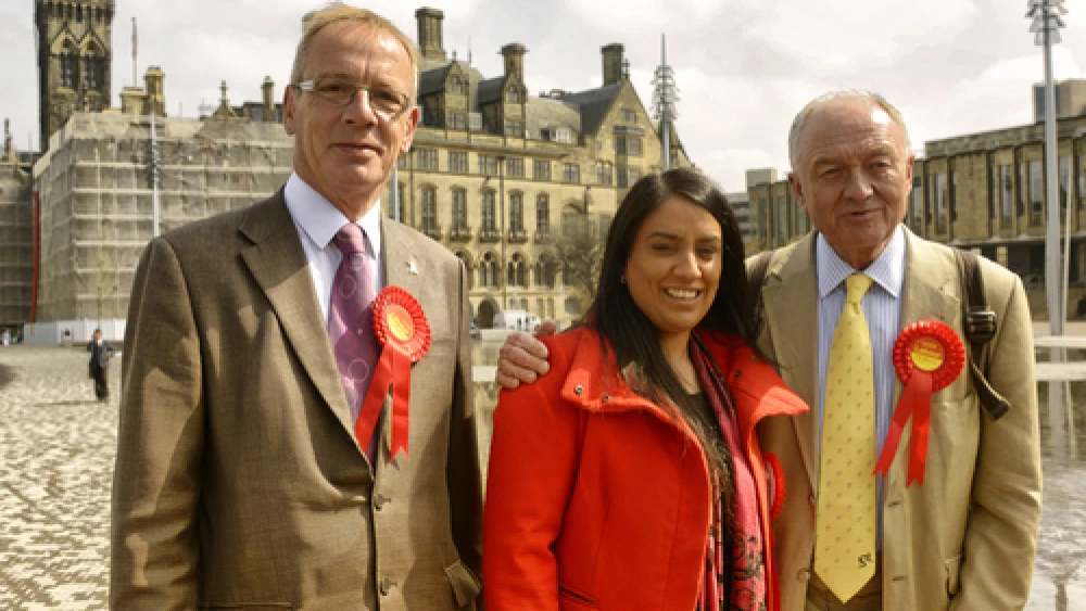 Pictured in the center is Naz Shah, who was suspended from the United Kingdom's Labour Party over a Facebook post in which she suggested the "relocation" of Israel. Credit: Wikimedia Commons.