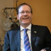 Isaac Herzog smiling