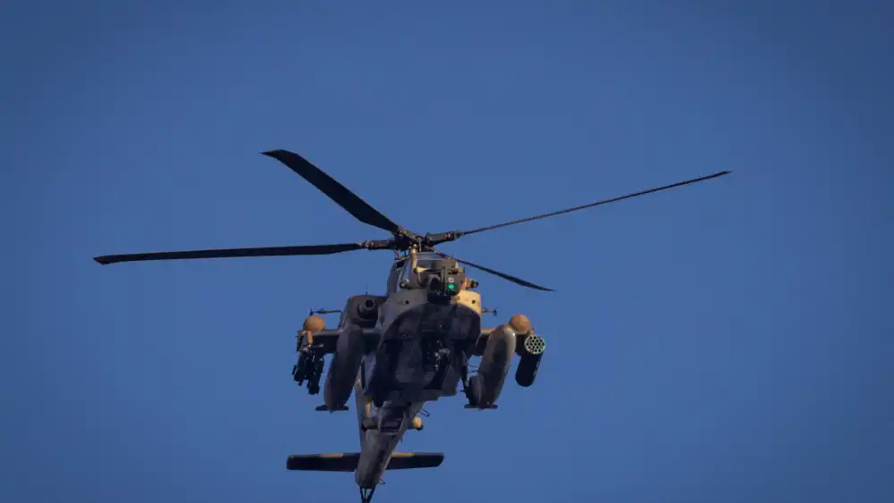 An Israeli Air Force helicopter flies above Kiryat Yam, near Haifa, Nov. 13, 2024. Photo by Yonatan Sindel/Flash90.