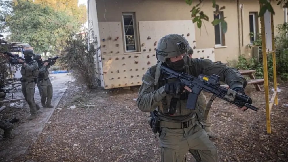 Israeli counter-terror forces patrol in Kibbutz Be'eri, near the Israeli-Gaza border in southern Israel. Oct. 22, 2023. Photo by Chaim Goldberg/Flash90.