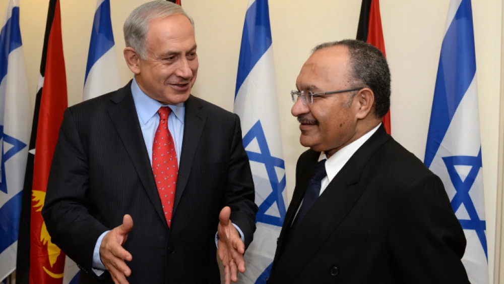 Israeli Prime Minister Benjamin Netanyahu with Papua New Guinea's prime minister Peter O'Neill in an Oct. 15, 2013 in Jerusalem. Photo by Kobi Gideon/GPO/FLASH90