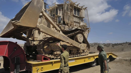 IDF Engineering Corps troops moving an IDF Caterpillar D-9 armored bulldozer, in the northern Golan Heights, on Sept. 19, 2024. Photo by Michael Giladi/Flash90.