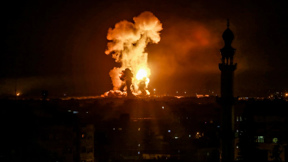 Smoke and fire rise following an Israeli airstrike in the southern Gaza Strip early on Oct. 27, 2018. Credit: Abed Rahim Khatib/Flash90.