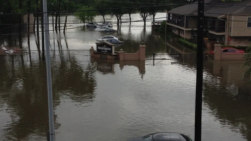 Click photo to download. Caption: The flooded street outside of the Houston apartment building of JNS.org's Jacob Kamaras on April 18, 2016. Credit: Jacob Kamaras.