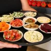 Salads served in the Fortuna restaurant at the Mahane Yehuda open-air market in Jerusalem, July 3 2011. Photo by Nati Shohat/Flash90.