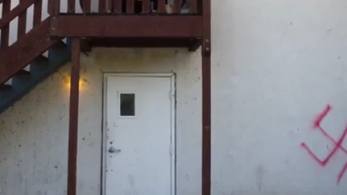 A swastika that was spray-painted on the Alpha Epsilon Pi (AEPi) Jewish fraternity house at University of California, Davis. Source: YouTube.