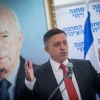 Avi Gabbay, head of the Zionist Union alliance and the Labor Party, leads a Zionist Union meeting at the Israeli Knesset on Nov. 20, 2017. In the background is a photo of former Israeli prime minister and Labor leader Yitzhak Rabin. Credit: Yonatan Sindel/Flash90.
