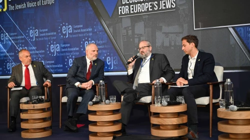 Raymond Forado, left, and other panelists discuss antisemitism in Madrid, Spain on May 13, 2025. Photo by Yoav Dudkevitch.