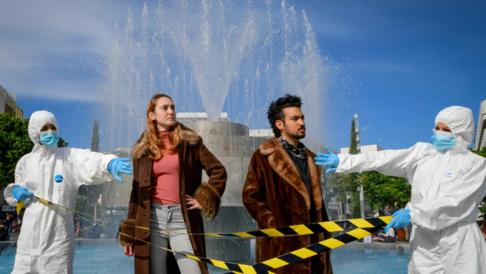 Israeli anti-fur activists protest against the use of fur in the fashion industry in Tel Aviv, Israel, Nov. 24, 2020. Photo by Avshalom Sassoni/Flash90.